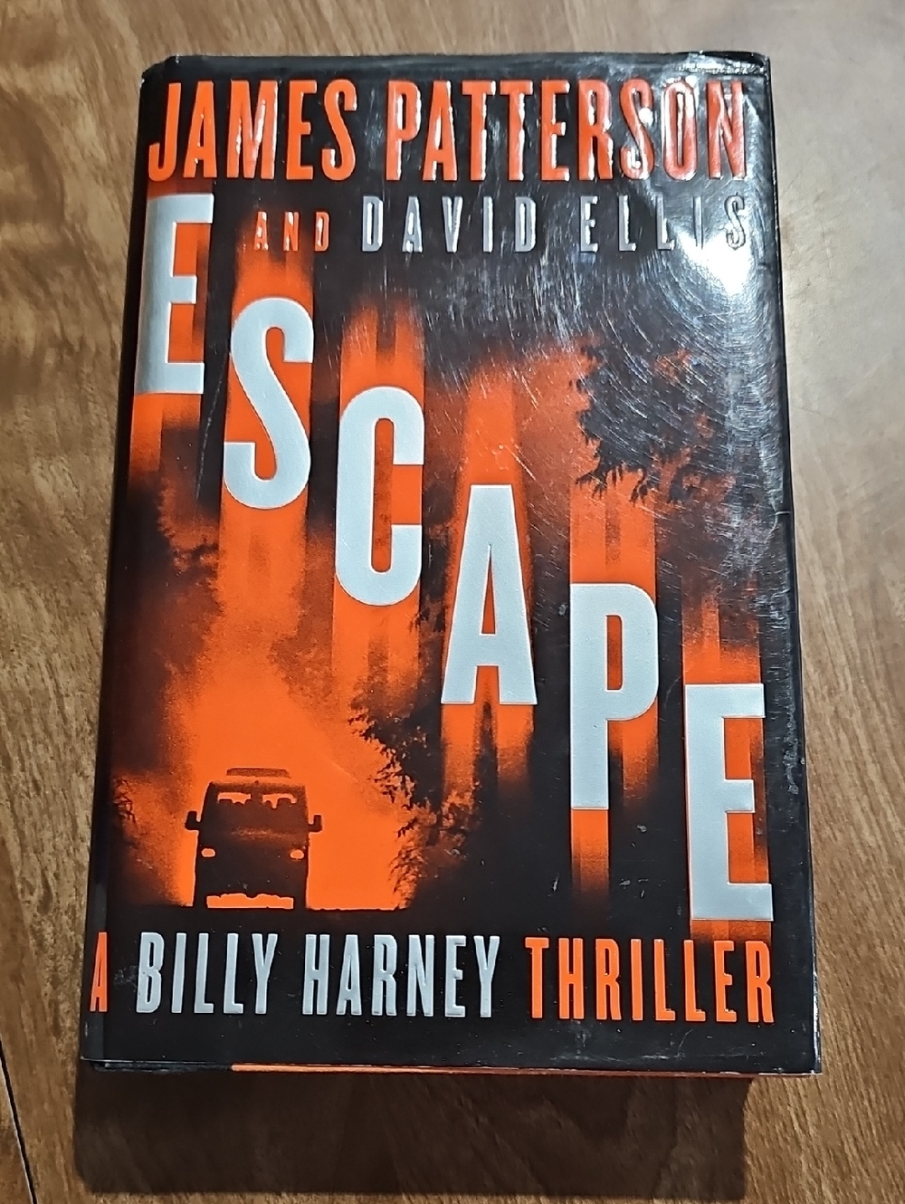 Escape by James Patterson and David Ellis - Thriller Novel (Orange & Black)